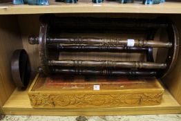 A folding chess board and a wooden stand.