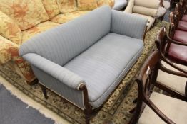 A French style low back settee with carved beechwood frame.