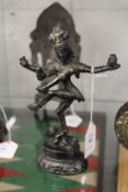 A small bronze four armed goddess or deity, possibly 19th century.