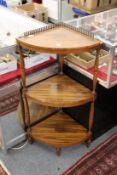 A rosewood three tier corner what-not.