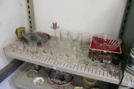 A shelf of glassware.