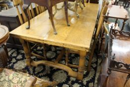 A good large oak draw leaf dining table.