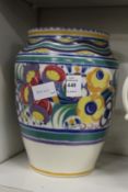 A large Poole Pottery vase.