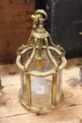 A small brass hall lantern.