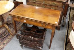 A George III mahogany rectangular foldover tea table with a single drawer.
