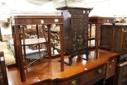 A pair of mahogany tray top lamp tables.