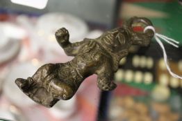 A small 19th century or earlier bronze pendant / amulet of a deity, possibly Tibetan.