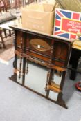 A Victorian walnut overmantle mirror.