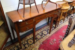 A George III mahogany satinwood sideboard.