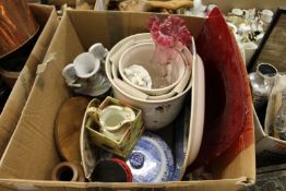 A box of decorative china and glass.