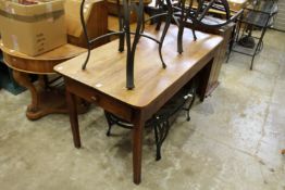 A good 19th century elm plank top kitchen table with a drawer to each end.