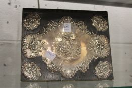 A silver mounted leather blotter.