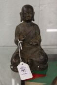 A bronze figure of a seated Buddha, possibly 19th century.