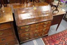An 18th century walnut bureau.