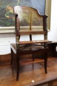 A 19th century mahogany child's Bergere style high chair.