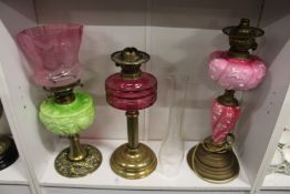 Three Victorian oil lamps.