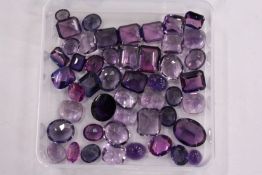 A box of loose coloured stones.