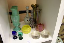 A small group of colourful glassware.