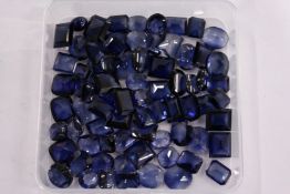 A box of loose coloured stones.