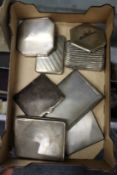 A collection of silver cigarette cases and compacts.
