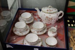 An early 20th century porcelain child's tea set.