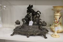 A decorative spelter inkstand.