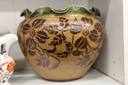 A Royal Doulton jardiniere.