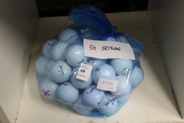 A bag of fifty Srixon golf balls.