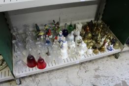 Decorative glass, china and brass bells.