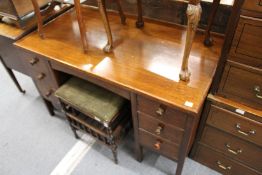 An oak pedestal desk.