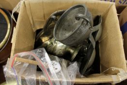 A box of pewter and other items.