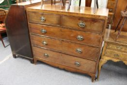 A Georgian mahogany chest of drawers.