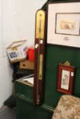 A reproduction stick barometer / thermometer.