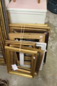 A quantity of picture frames.