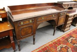 A good 19th century mahogany sideboard with galleried back, three frieze drawers, two cupboard doors