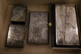 A Japanese sterling silver cigarette case with original box, a matching ladies' compact, another