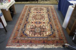 A Persian design carpet, cream ground with stylized decoration.