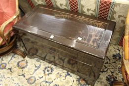 Henderson & Co, Hong Kong, a carved camphor wood coffer.