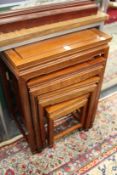 A nest of four Chinese hardwood tables.