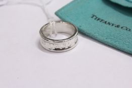 A silver ring.