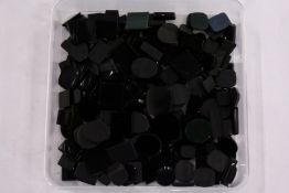 A box of loose coloured stones.