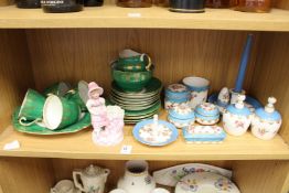 A shelf of decorative china.