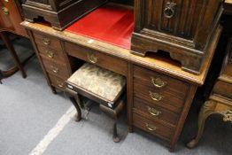 A Victorian walnut pedestal desk.