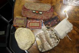 Seven assorted, embroidered and other bags.