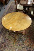 A 19th century mahogany circular tripod table.