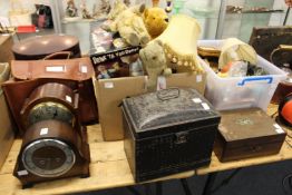 Two mantle clocks and miscellaneous items to include old Teddy bears.