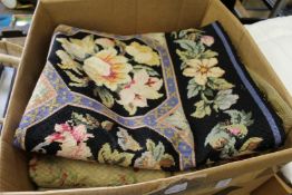 Two Aubusson style tapestry wall hangings and an embroidered throw or bed cover.