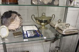Various plated wares to include a pair of entree dishes and covers.