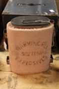 A rare warming pan for softening explosives, black japanned with pink cloth cover and stencilled