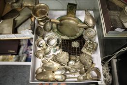 A collection of small silver ware to include a cup, a drum mustard, serviette ring, spoons, a pair